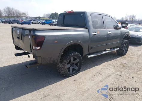 2010 Nissan Titan Le z USA, uszkodzony, nr VIN 1N6BA0EC5AN313085